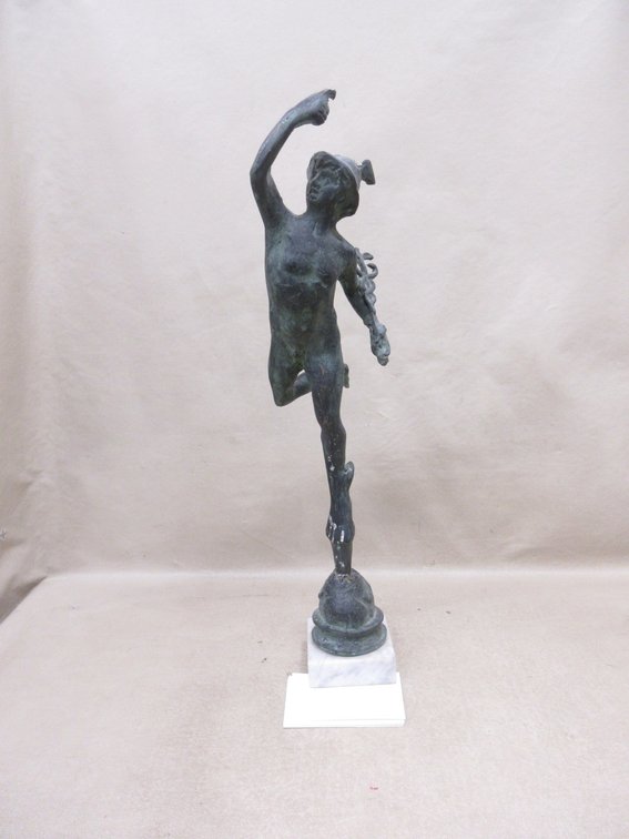 Roman or Greek God statue on marble base (has been repaired)