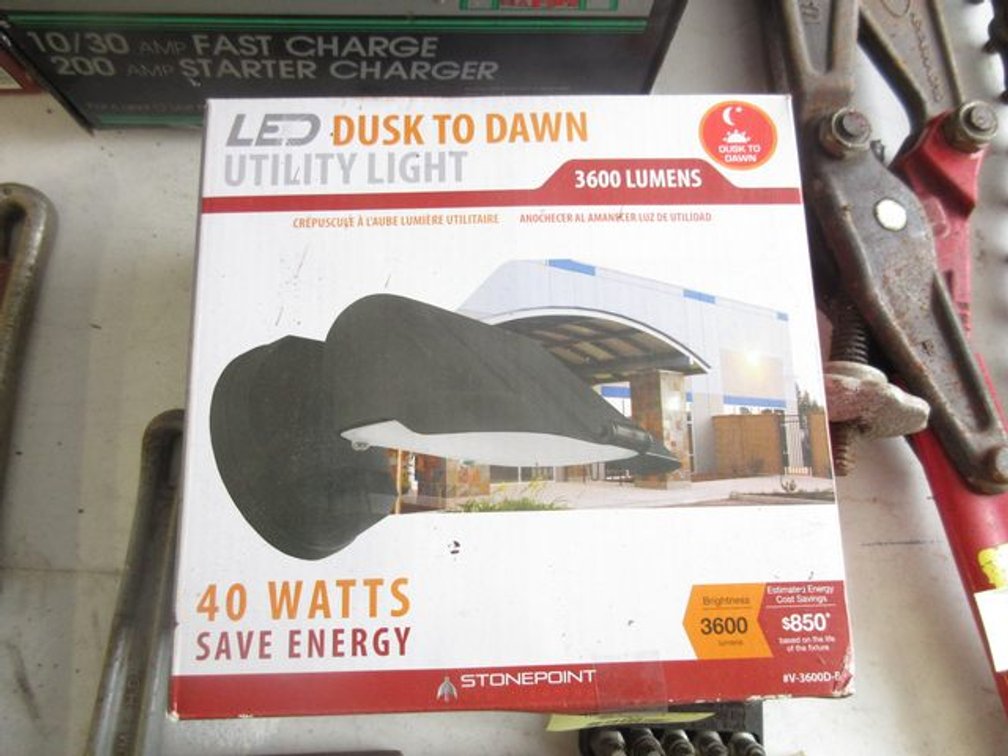 LED dusk to dawn utility light