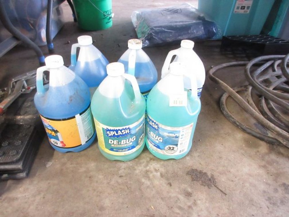(6) Jugs of windshield washer fluid