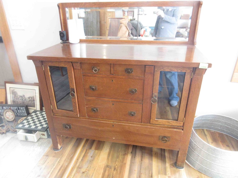 Antique oak buffet with (5) drawers and (2) glass side cabinets