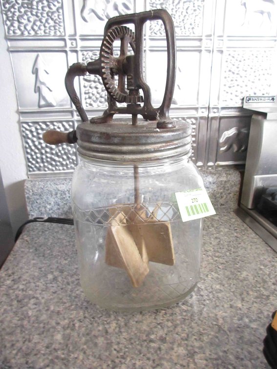 Antique glass butter churn