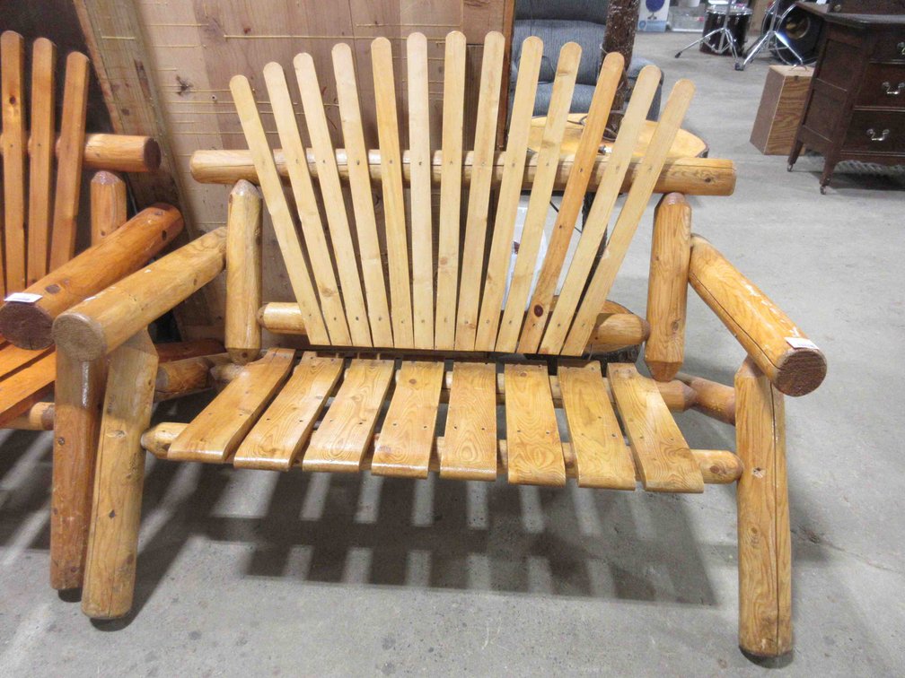 Rustic cedar log Adirondack bench