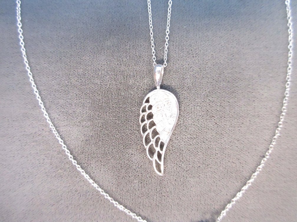Sterling silver necklace with Wing pendant and diamond accent