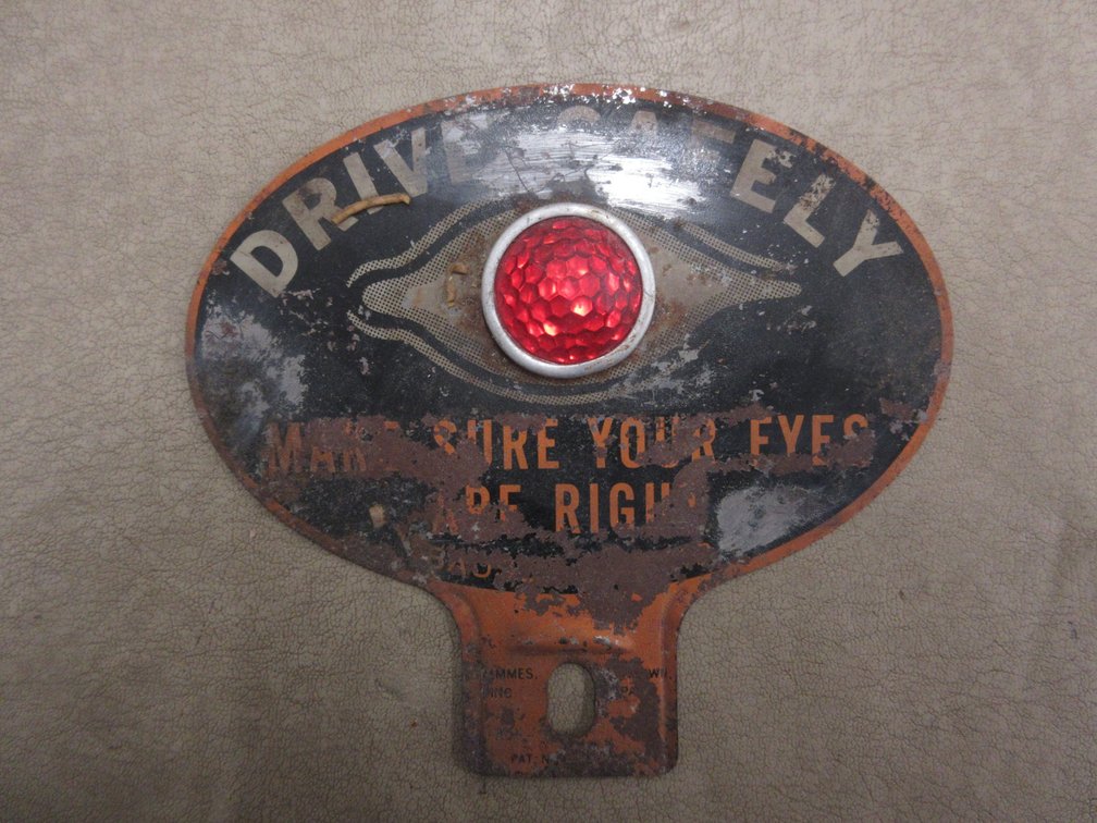 "Drive Safely" license plate topper