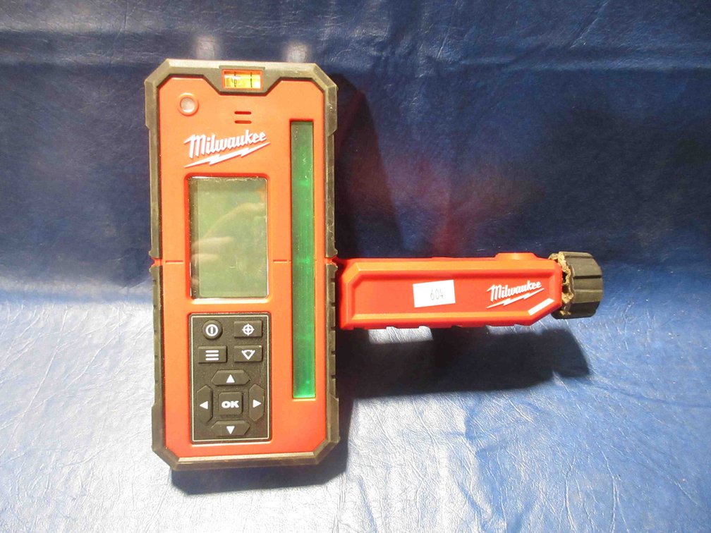 Milwaukee green interior rotary laser remote control and receiver