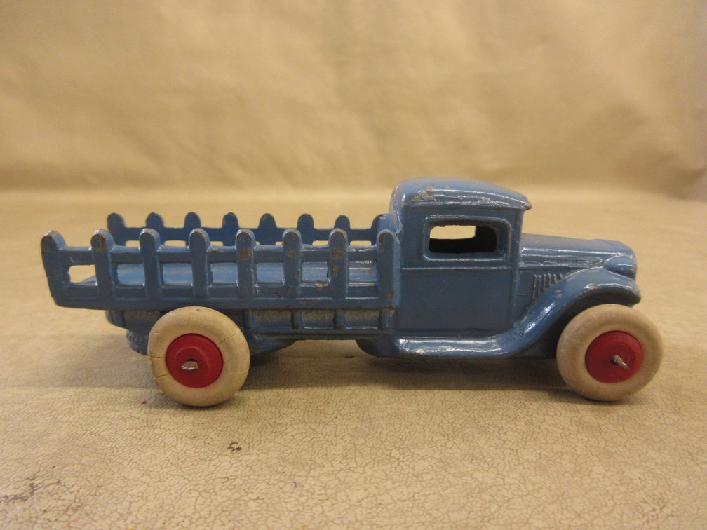 Cast metal truck with rubber wheels