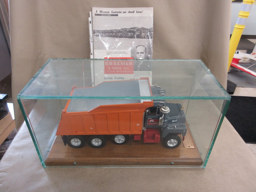 Cast metal toy Mack truck with "Kraemer & Sons, Plain, Wisconsin" emblem