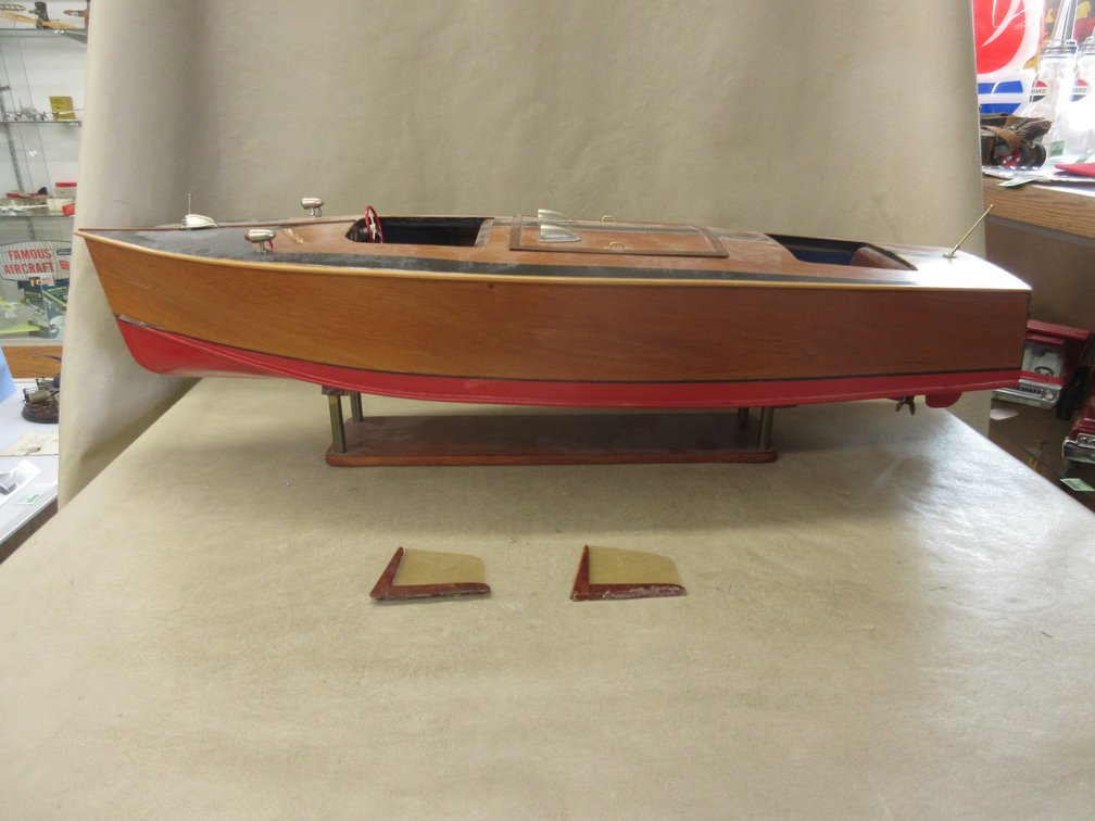 Wood model boat on stand