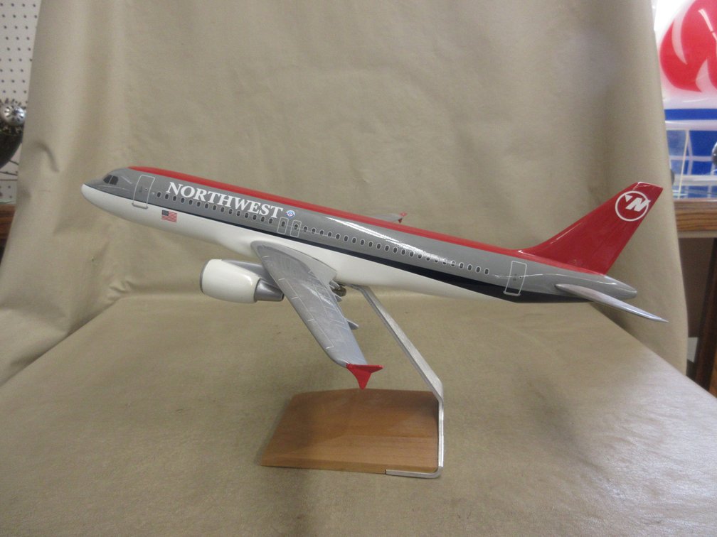 Northwest Airlines model airplane on stand