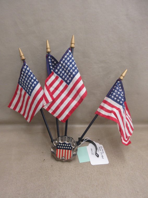 1930's license plate topper with flags