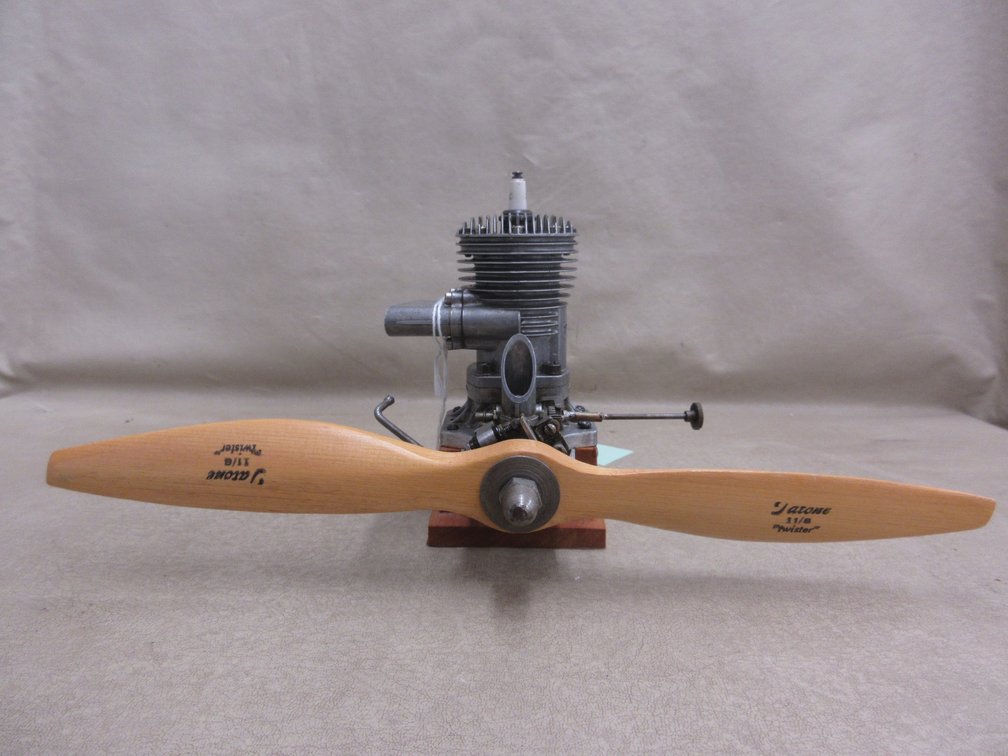 Anderson Spitfire model engine on stand