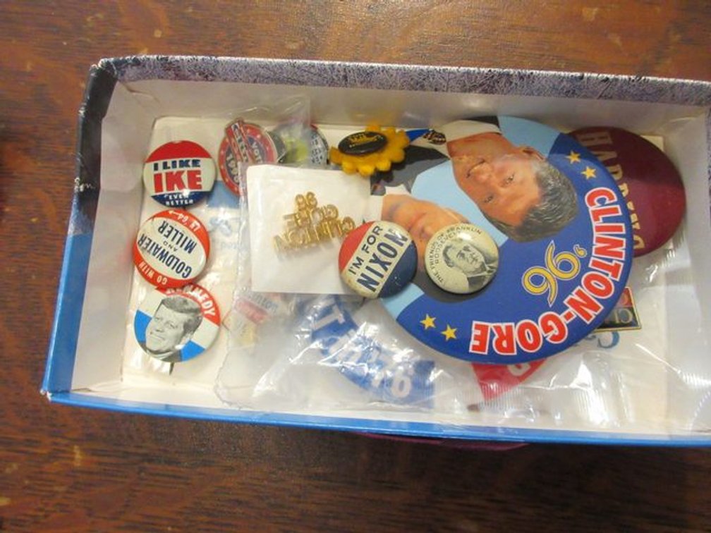 Group of political pins and buttons