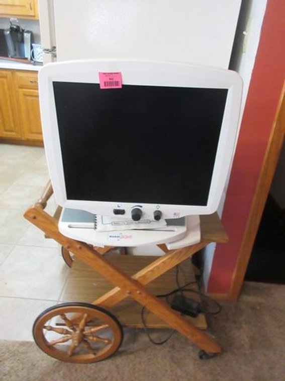 Magni Sight viewer on oak rolling tea cart