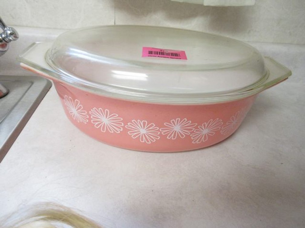 Vintage pink covered Pyrex casserole