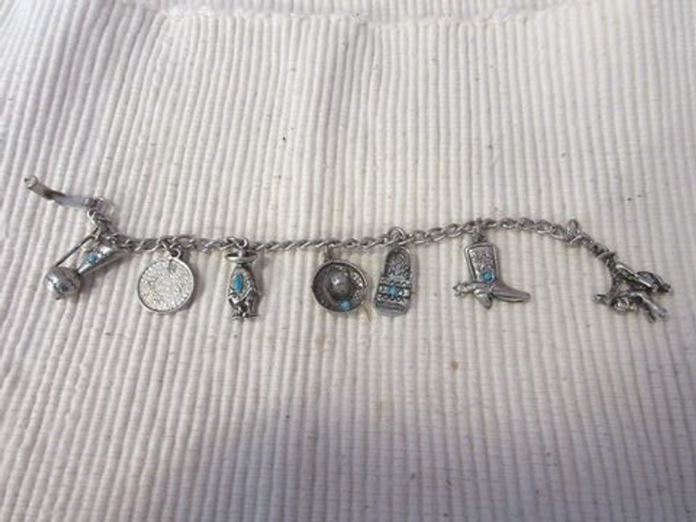 Silver tone charm bracelet