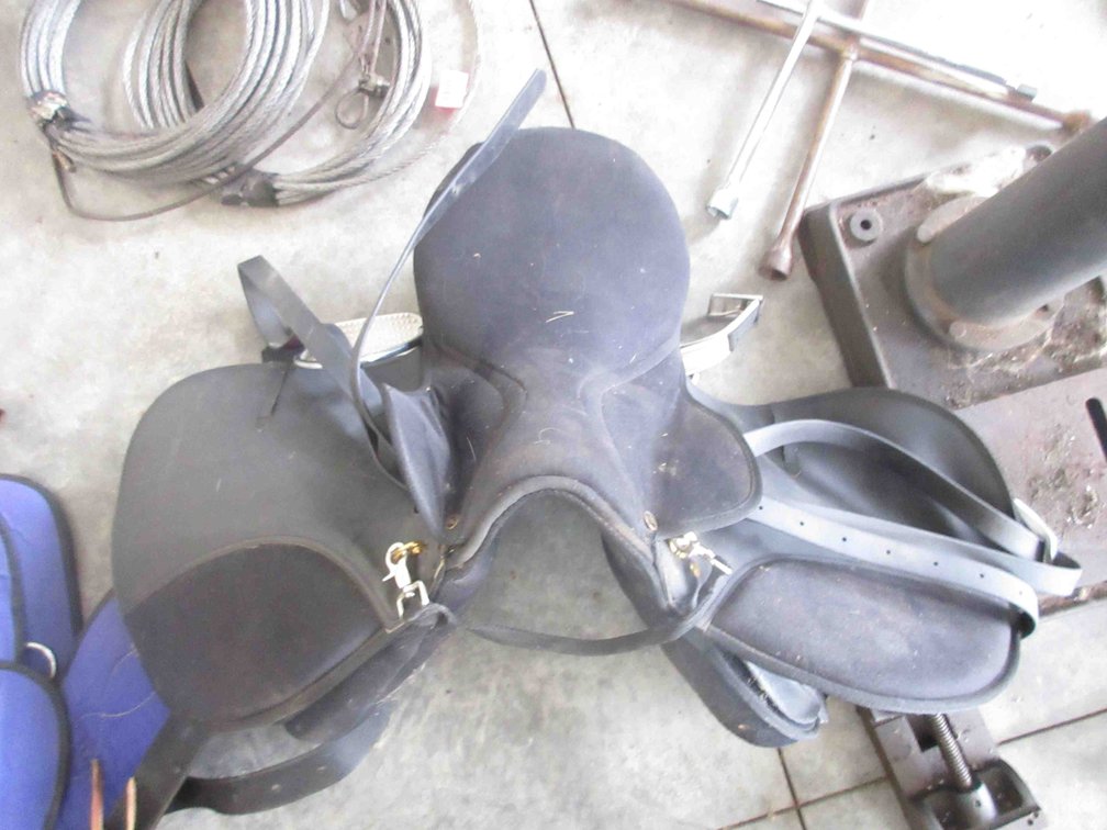English saddle with stirrups