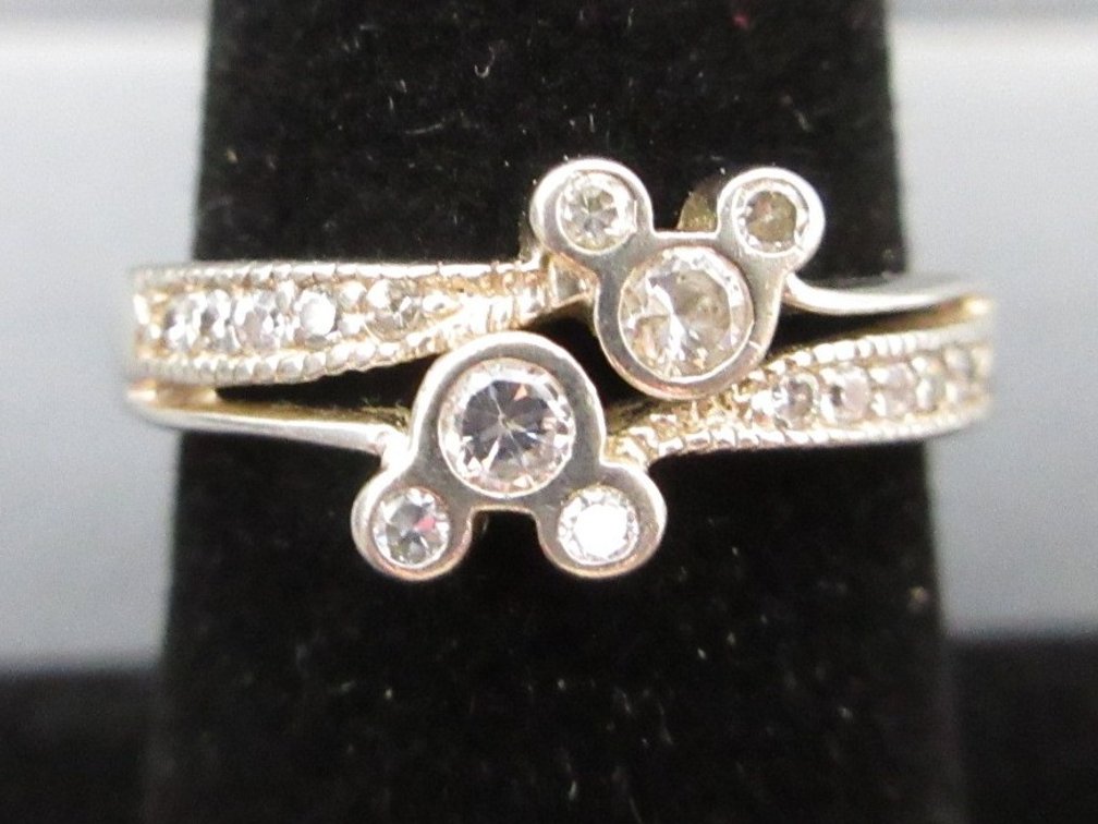 Sterling silver "Disney" brand Mickey/Minnie ring with clear stone accents