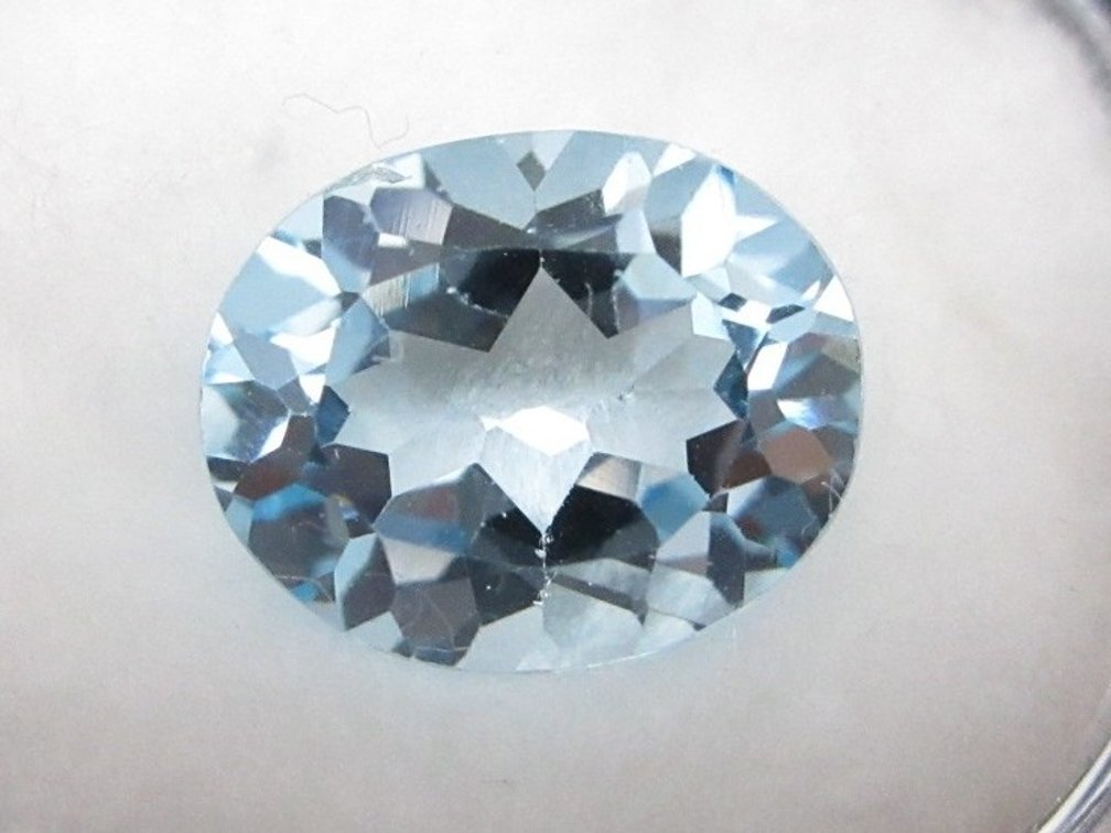 Precious oval blue topaz stone