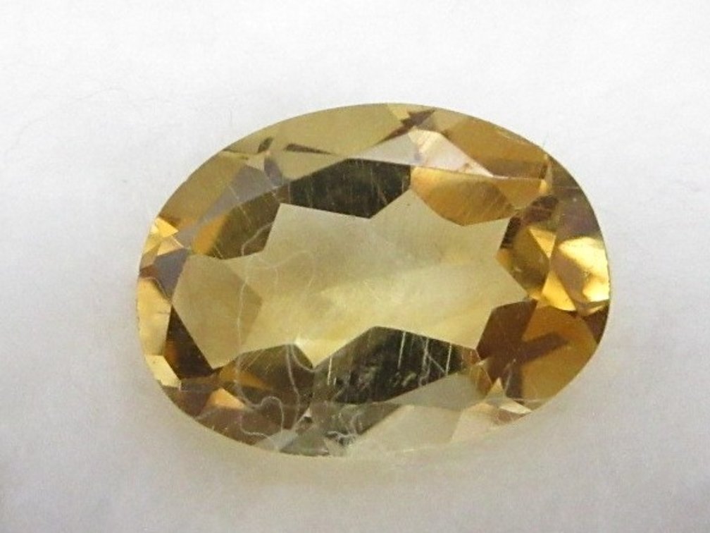 Precious oval yellow topaz stone