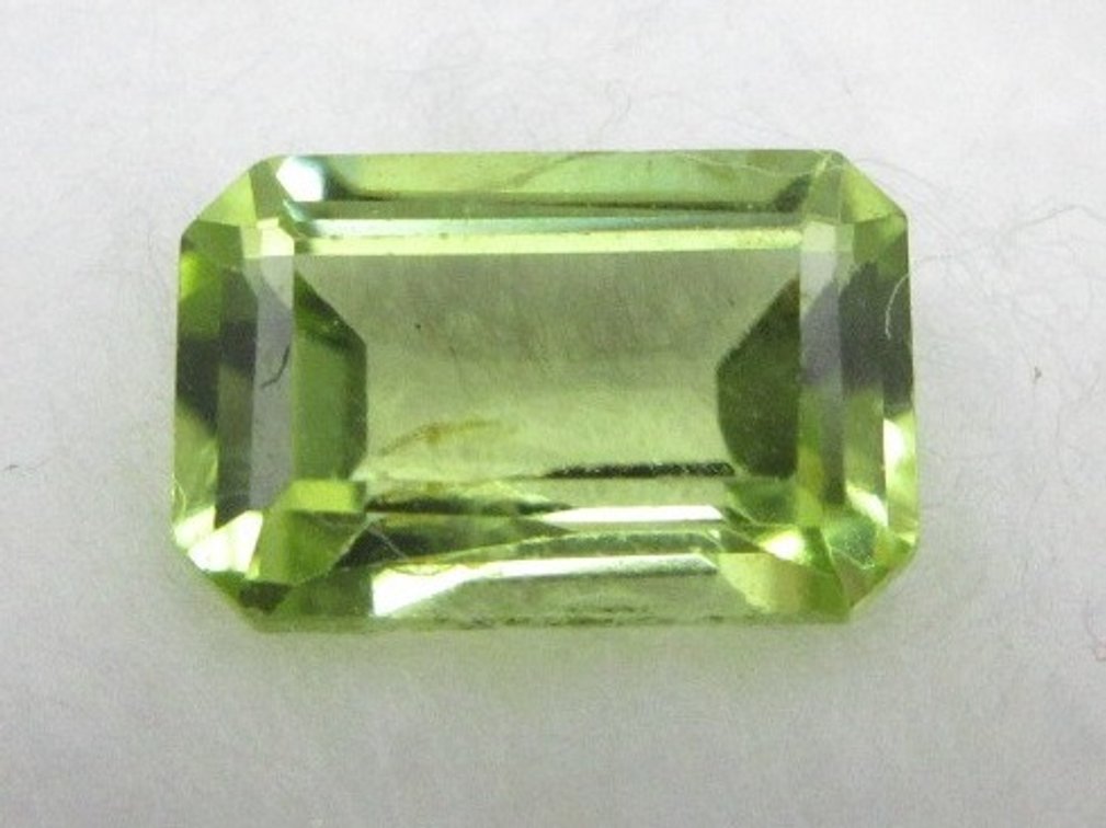 Precious emerald cut topaz stone