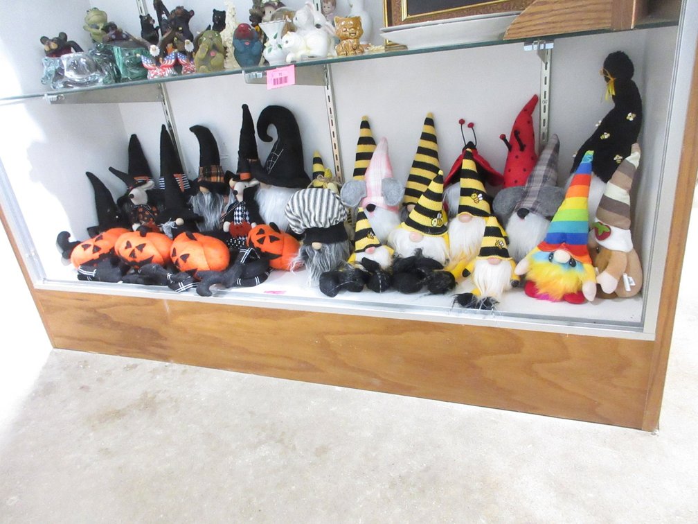Shelf of gnomes and Halloween decoration