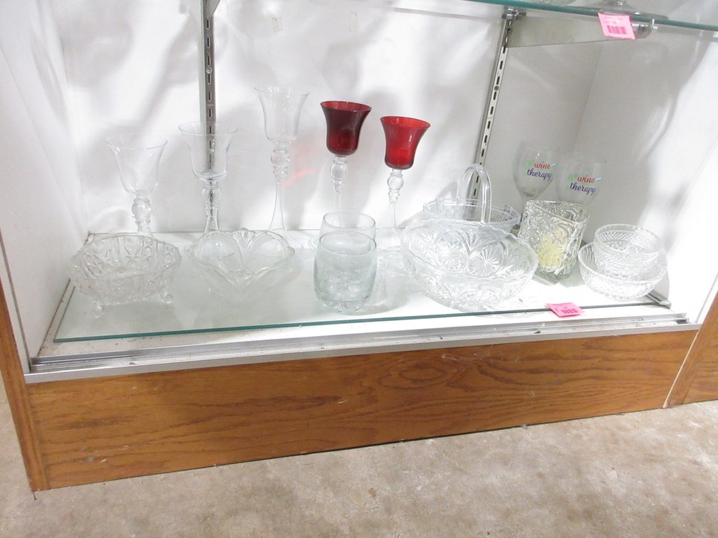 Shelf of crystal glassware
