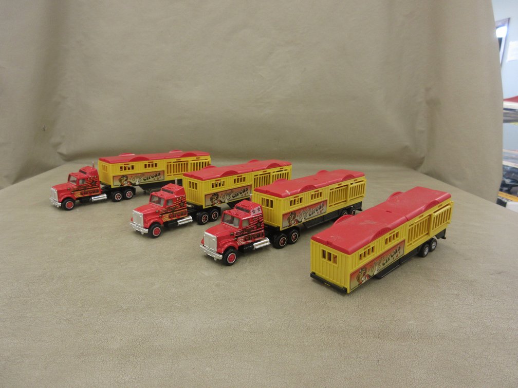 (4) Majorette miniature Magic circus semi haulers, missing one tractor