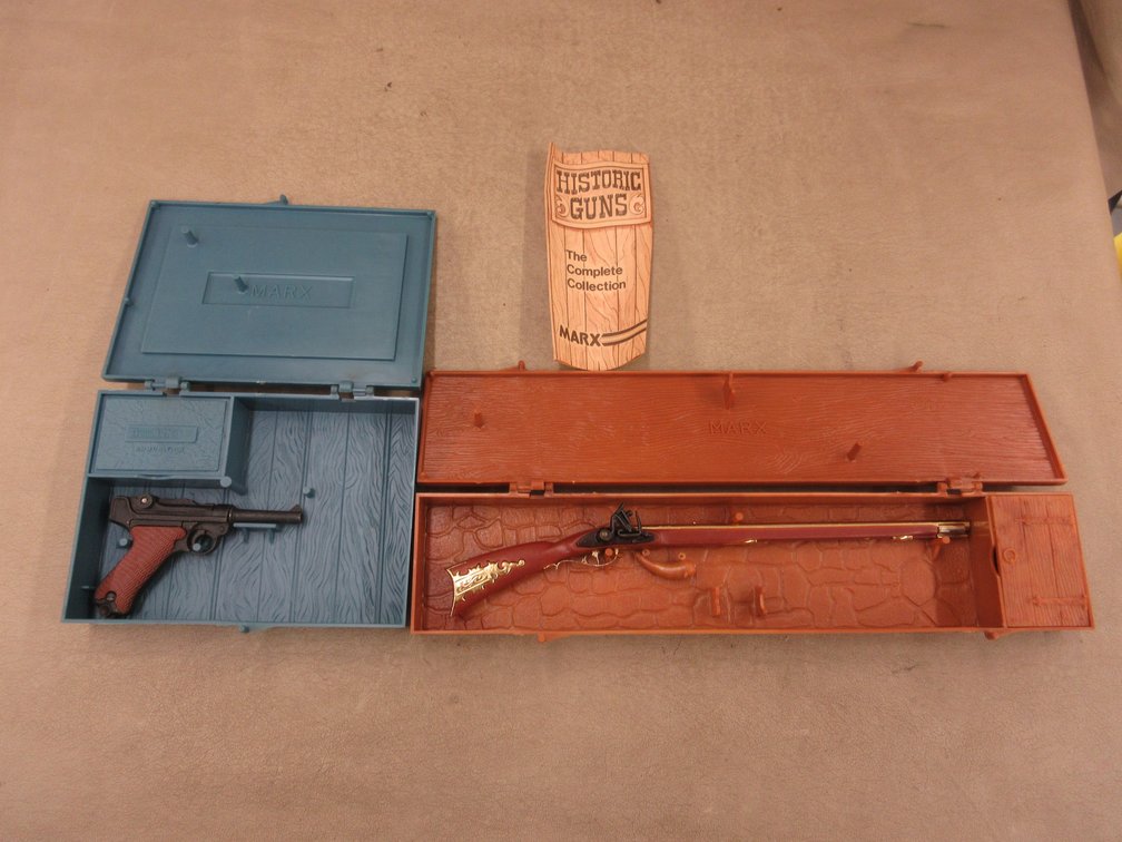(2) Marx toy guns in cases