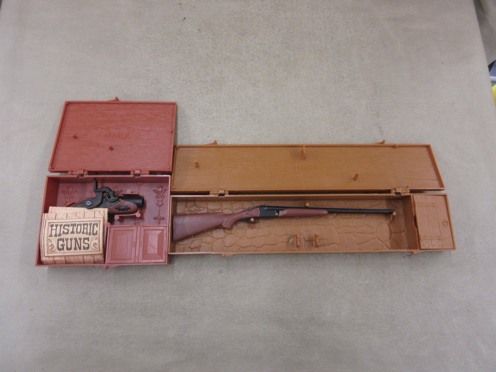 (2) Marx toy guns in cases