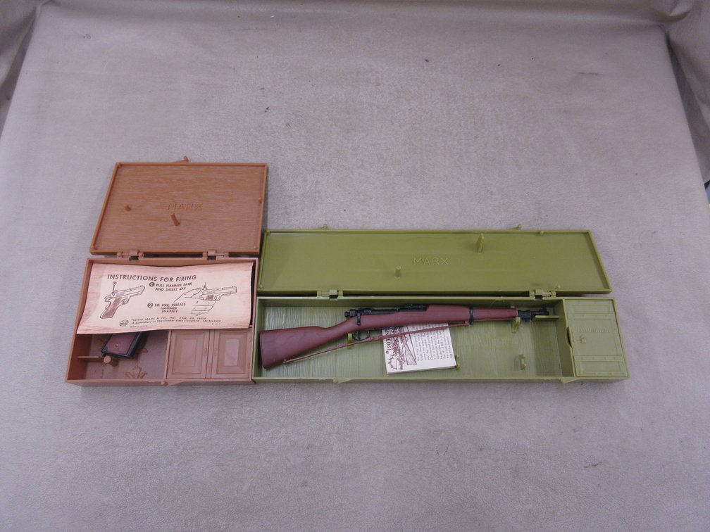 (2) Marx toy guns in cases