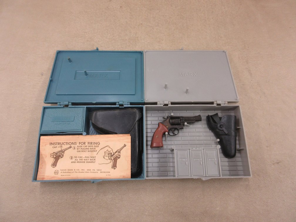 (2) Marx toy guns in cases
