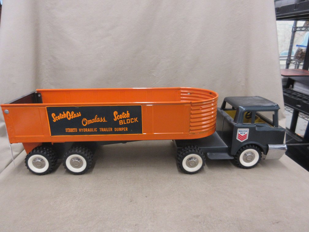 Structo pressed steel Master Mix truck with Scotch Olass hydraulic trailer dumper