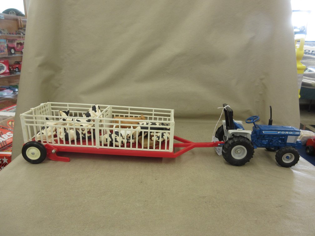 Ertl die cast Ford 1710 tractor with Scale Models 16"L trailer full of cows