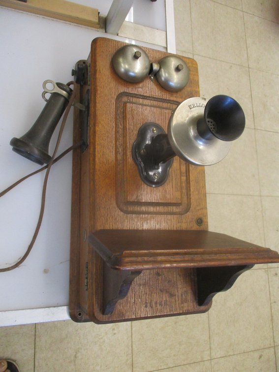 Antique oak wall telephone