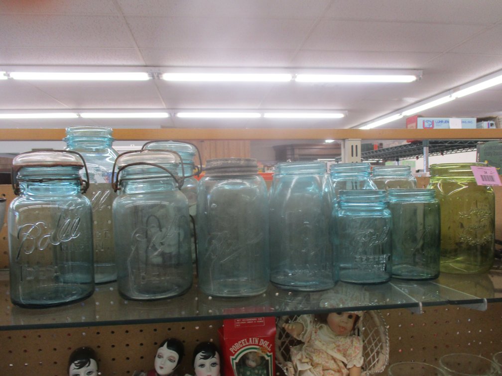 Group of blue glass canning jars
