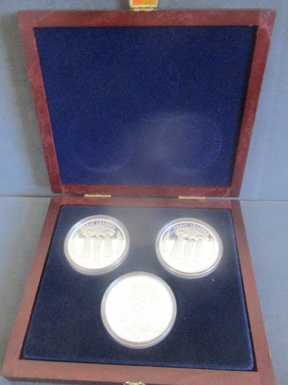 American Mint silver-plated 1.5"W coins