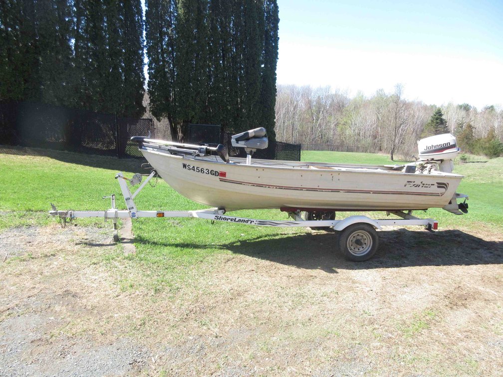 Fisher 14ft aluminum fishing boat on trailer