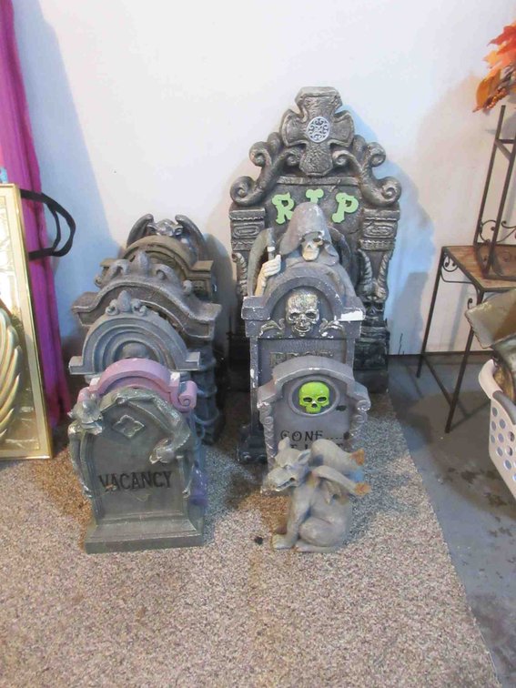Group of foam and cast tombstones