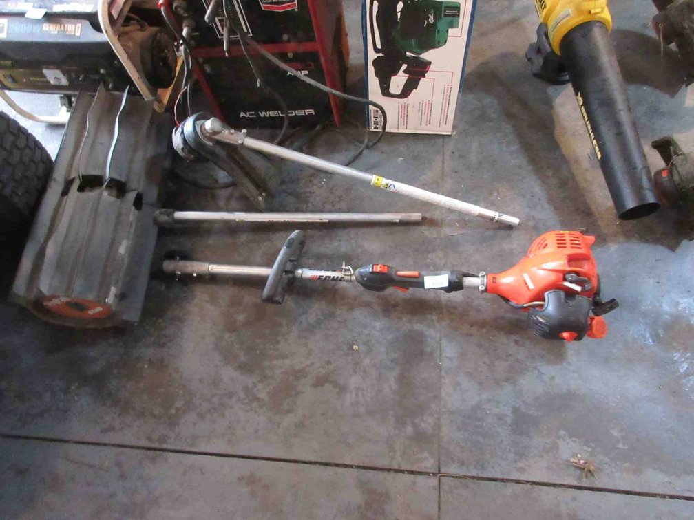 Echo gas trimmer with brush attachment