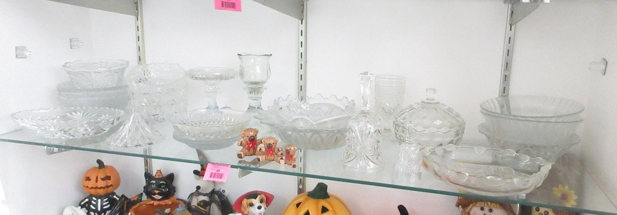 Shelf of  crystal including American Fostoria covered bowl