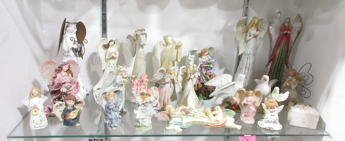 Shelf of angel figurines