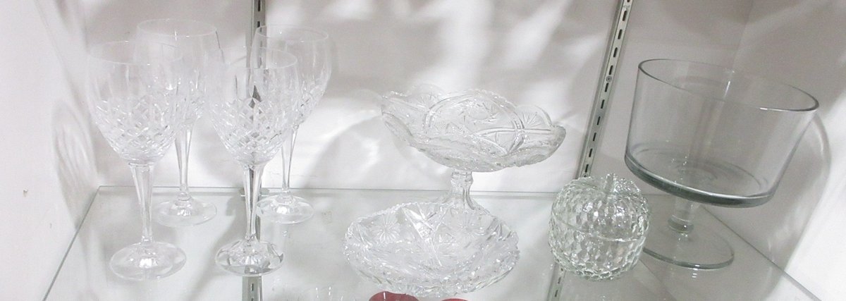 Shelf of crystal glassware
