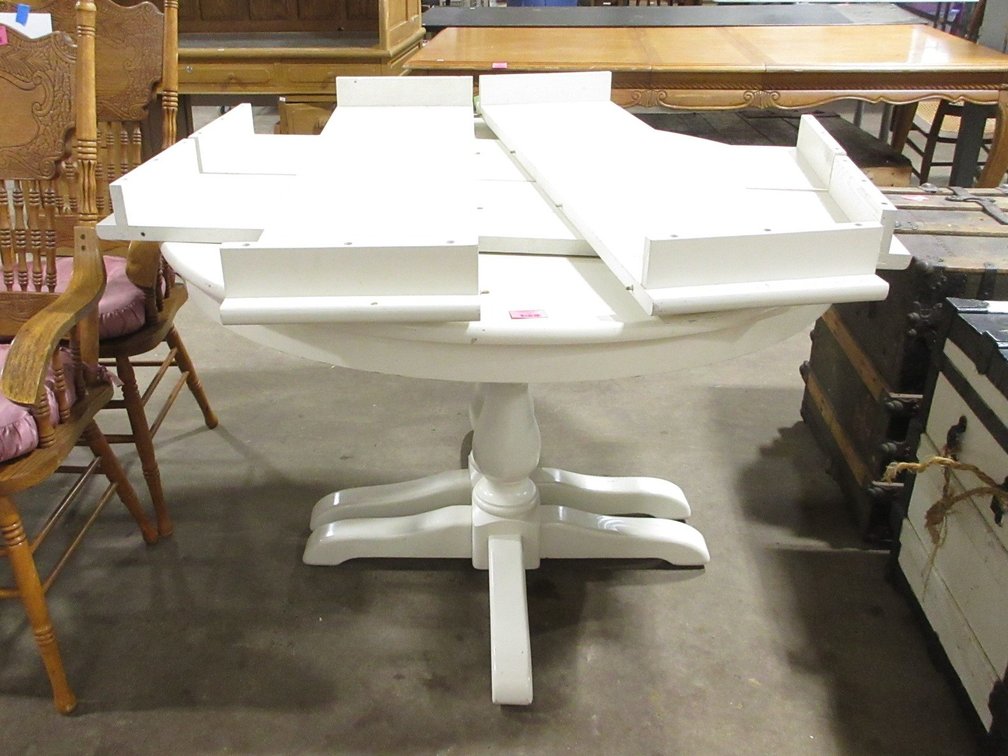 Double-pedestal round wood table