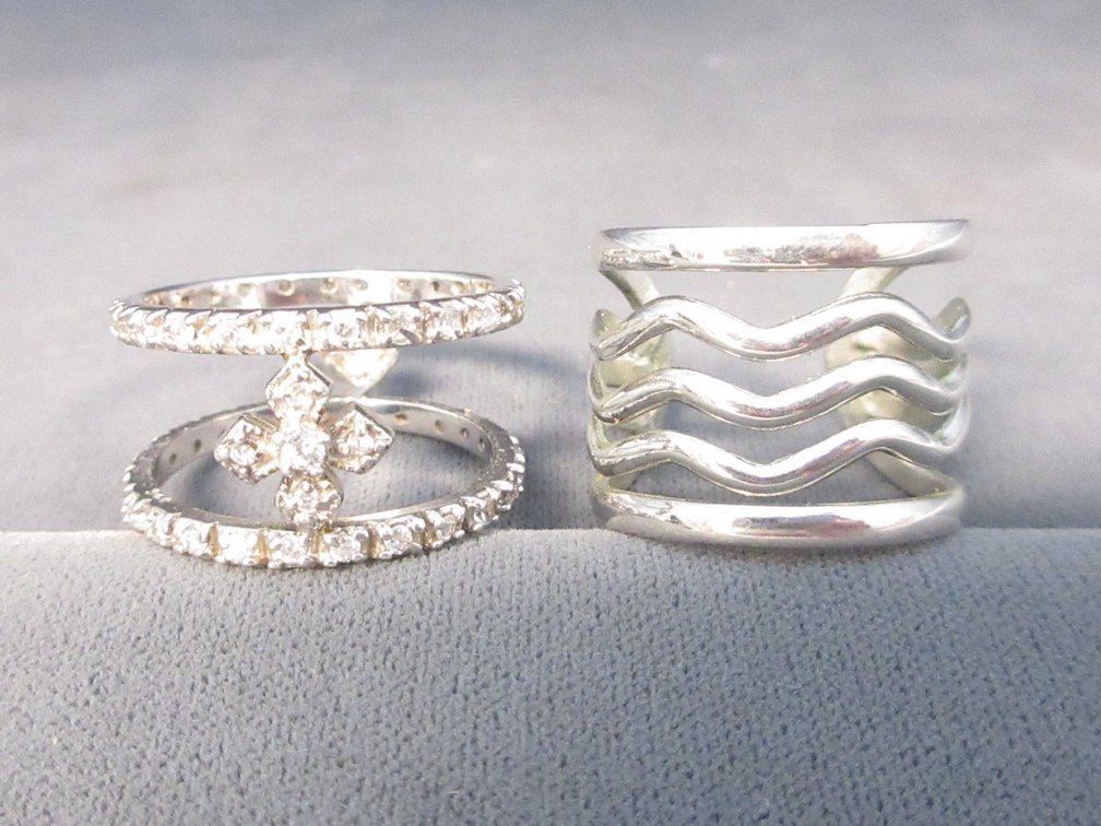 (2) Unmarked silver color rings