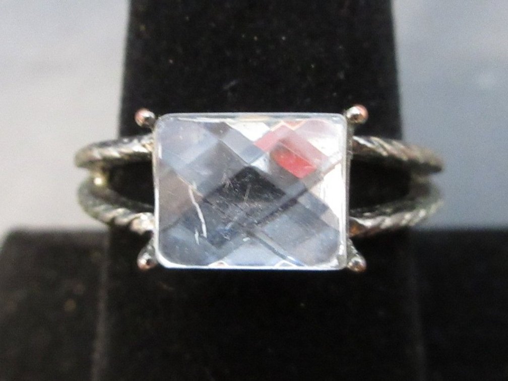 Unmarked ring with pillow-cut crystal stone
