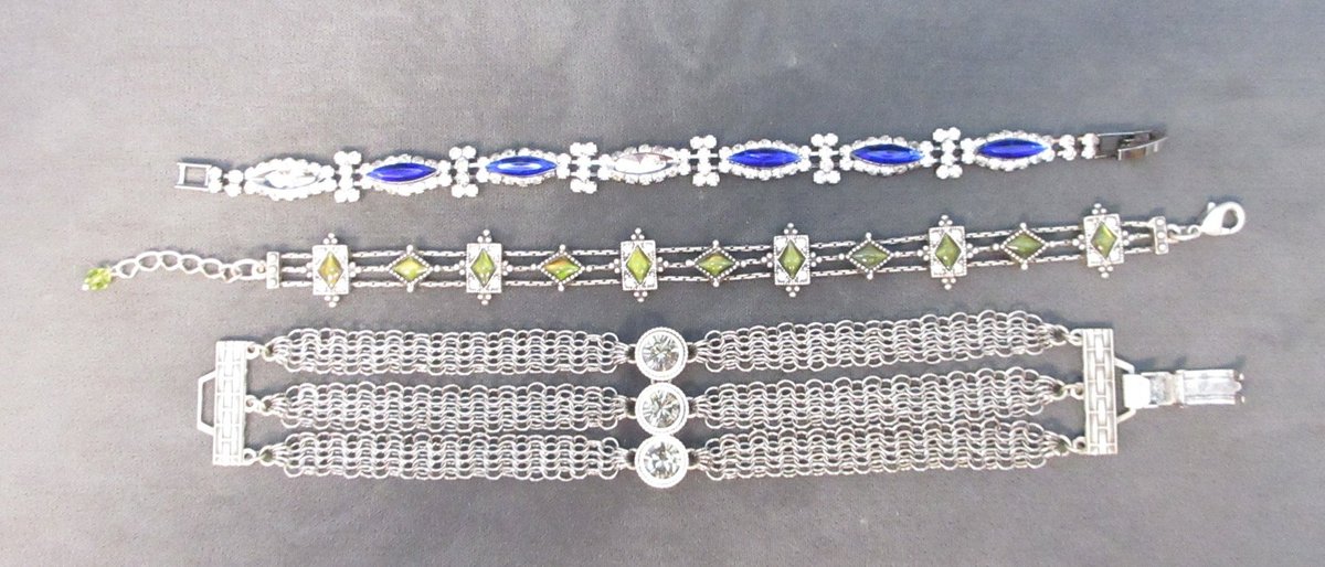(3) Unmarked silver color bracelets with stone accents