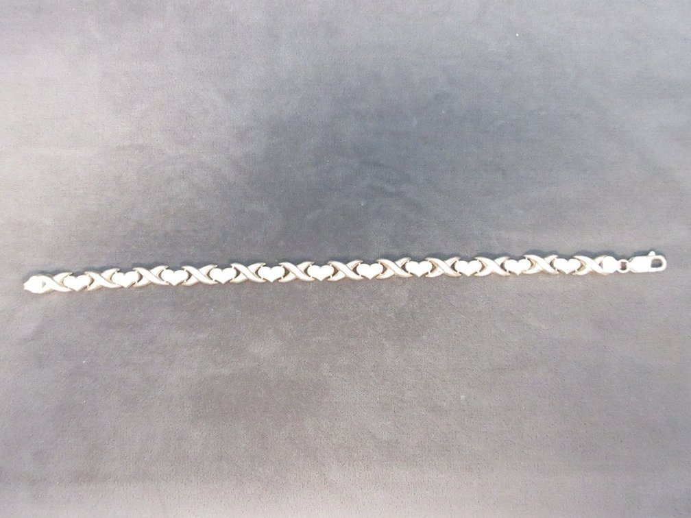 Marked .925 silver X and hearts bracelet