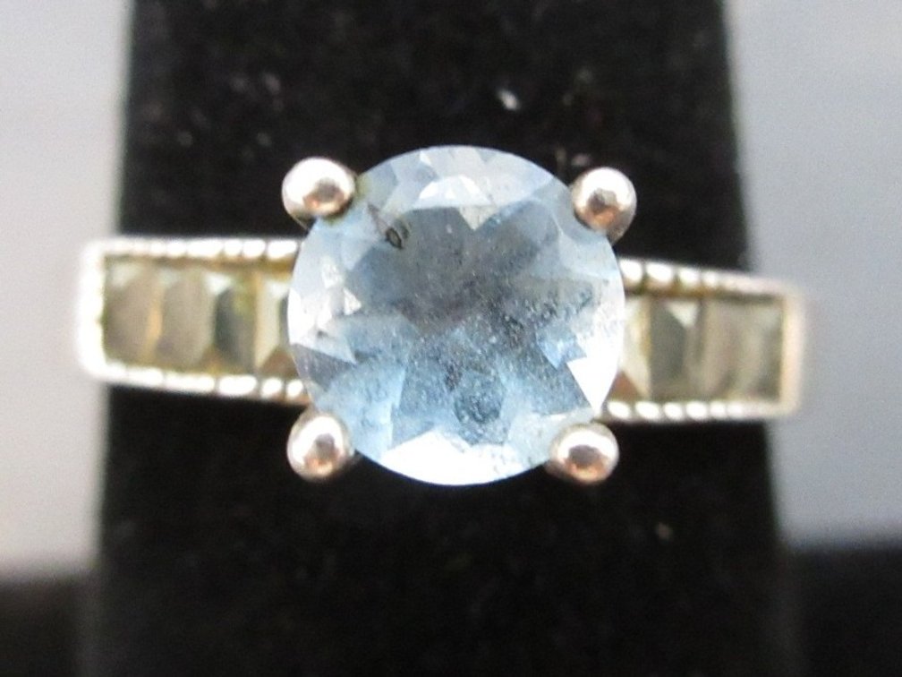 .925 Sterling silver ring with round blue stone and marcasite stones