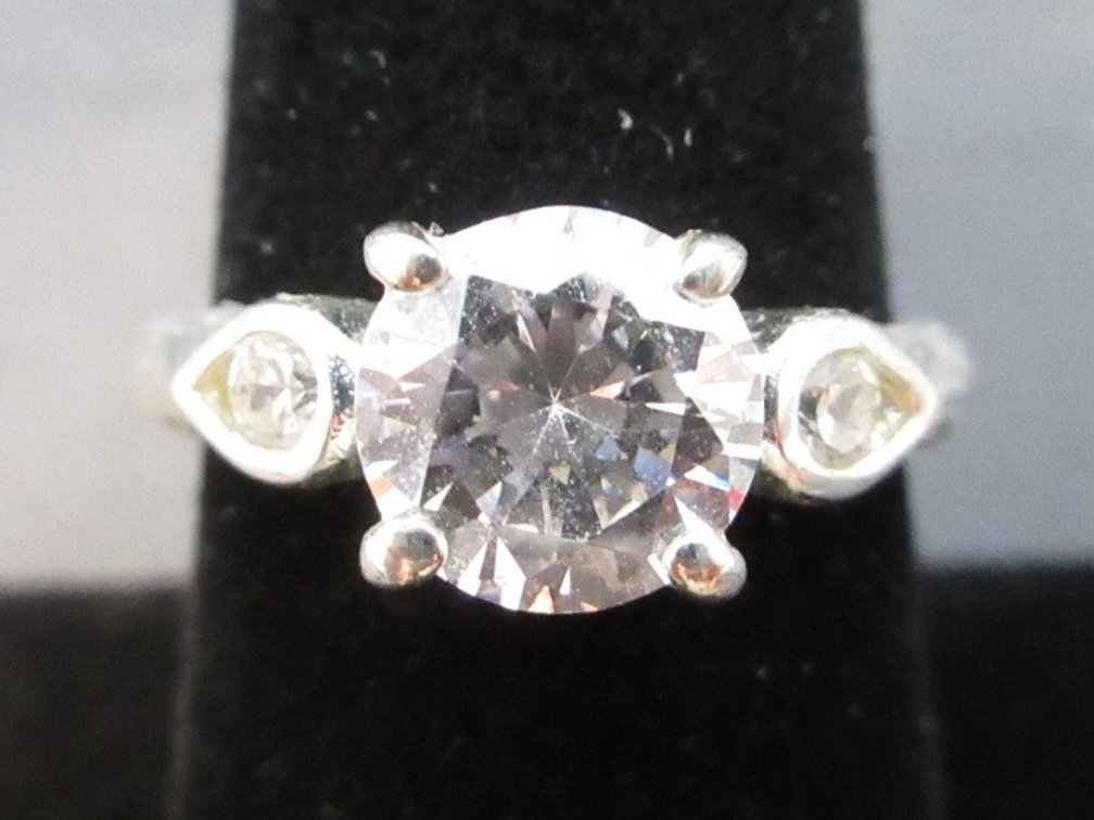 .925 Sterling silver ring with square cut CZ and accent stones