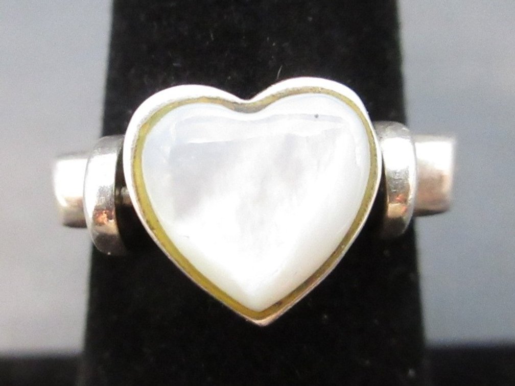 Marked .925 Sterling reversible heart ring